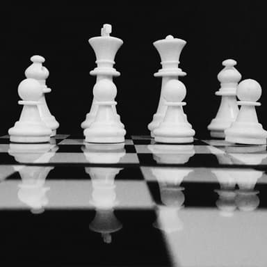 Chess pieces on a board, representing strategic thinking